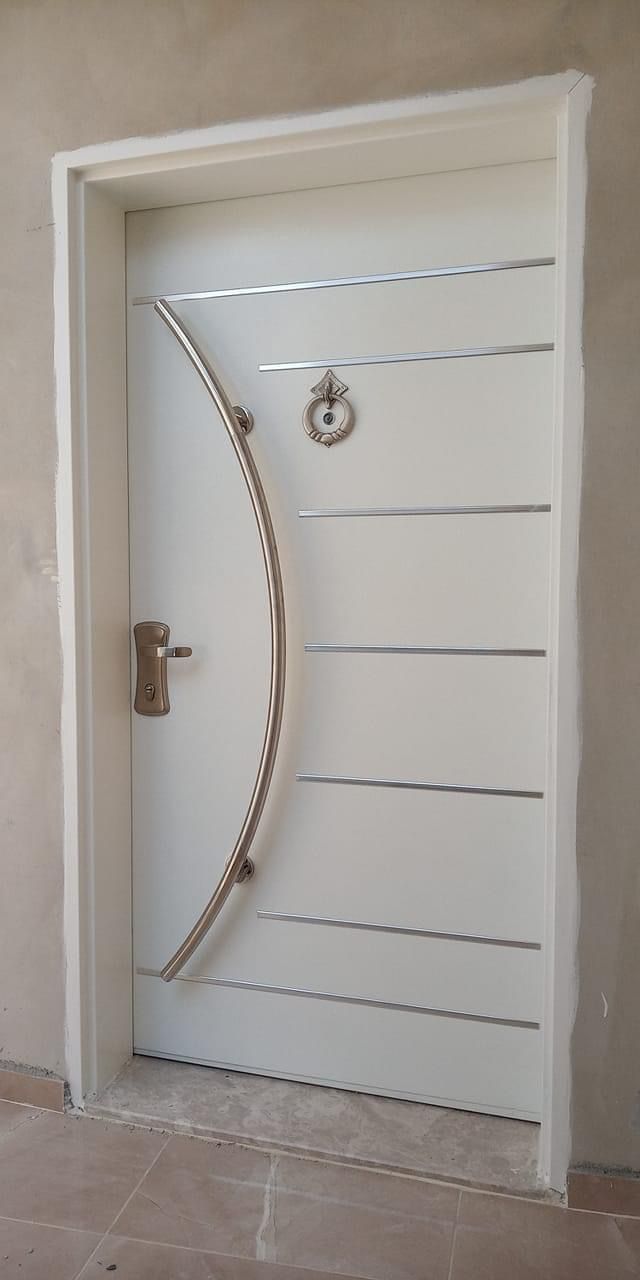 Modern White Entry Door with Curved Metal Handle
