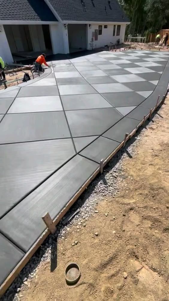 Modern Concrete Driveway With Checkerboard Pattern in Progress